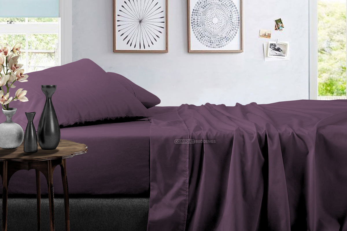 Plum Egyptian cotton bedding on a styled bed