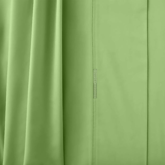 Fresh clean cotton pillowcases on a made bed