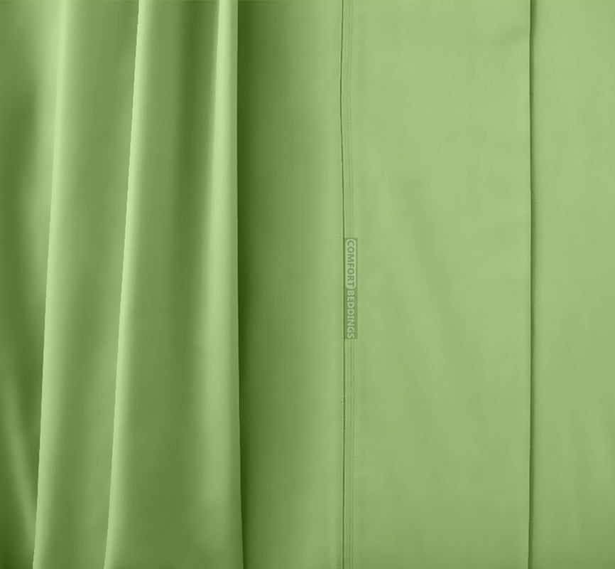 Fresh clean cotton pillowcases on a made bed