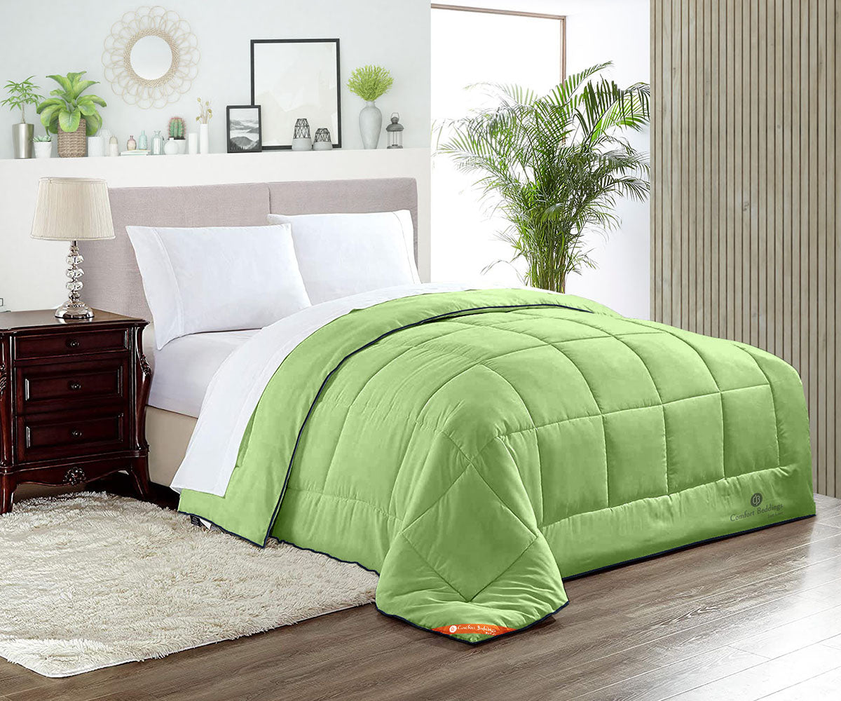 Luxury sage comforter on a made bed