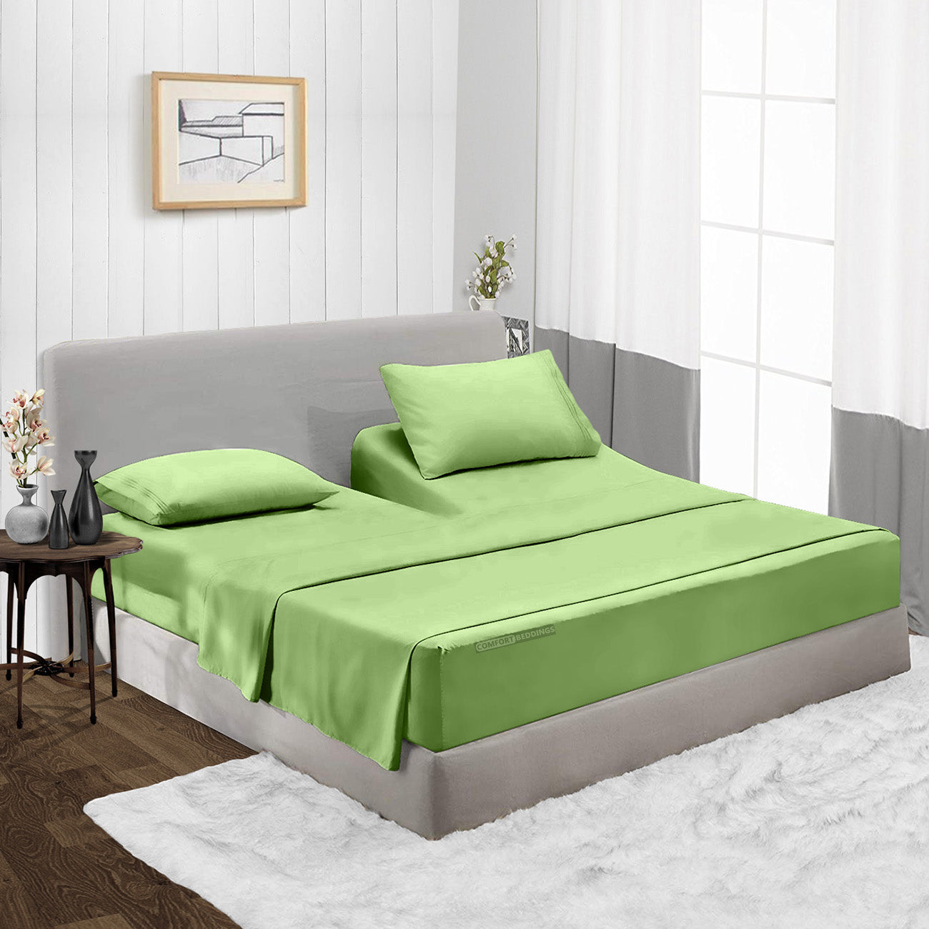 Sage split-head king sheet set on an adjustable bed