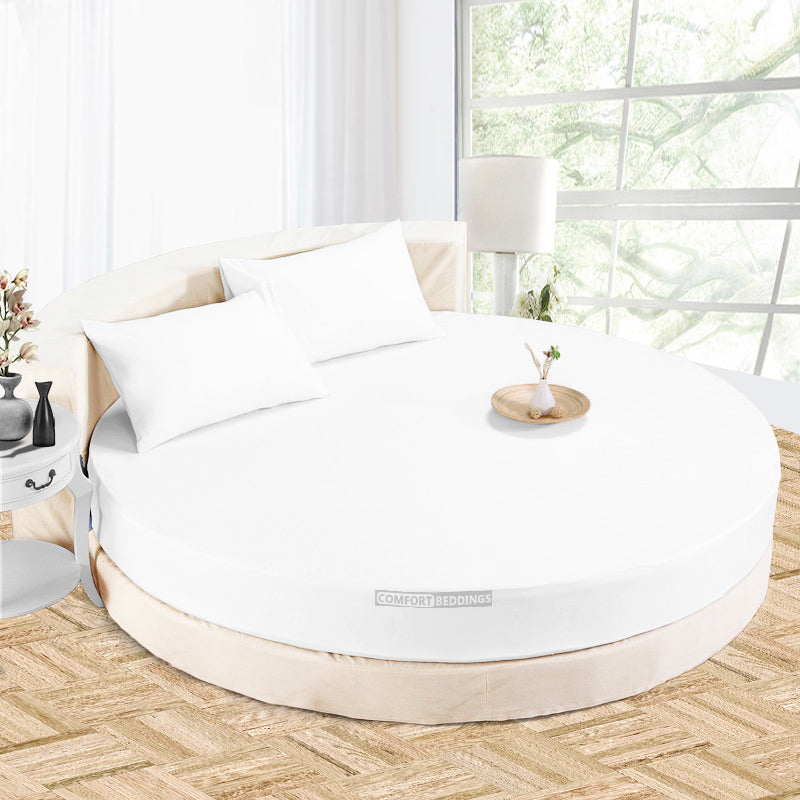 White round bed sheet set fitted to a circular mattress