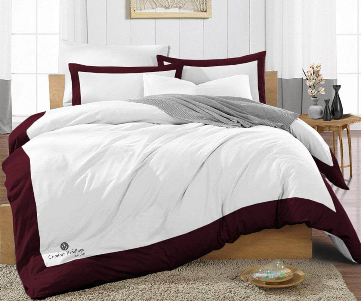 Wine two tone duvet cover set styled on a bed