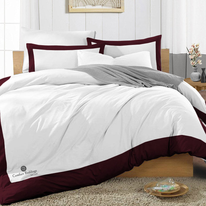 Wine two tone duvet cover set styled on a bed