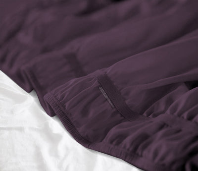 Plum king size wrap-around bed skirt